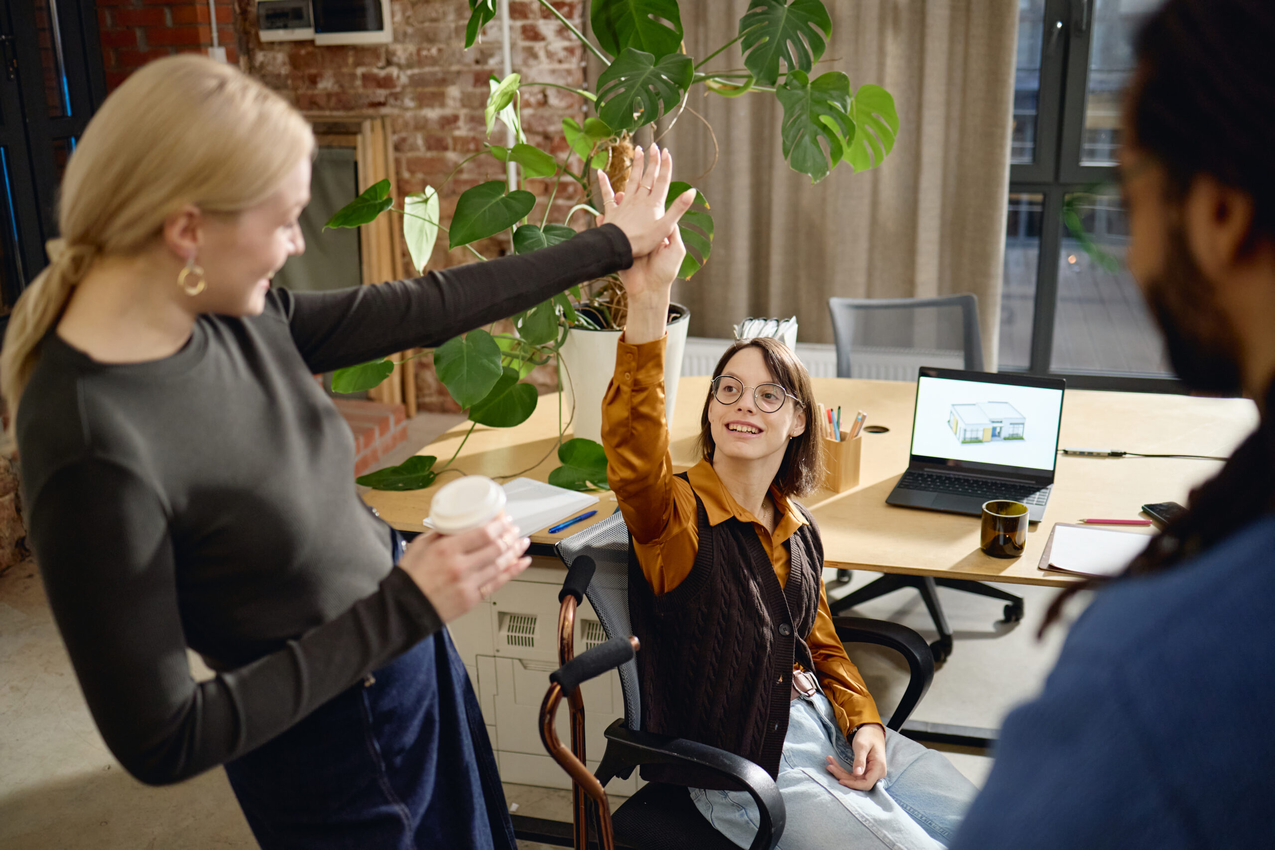 A team celebrating their personal and professional growth.